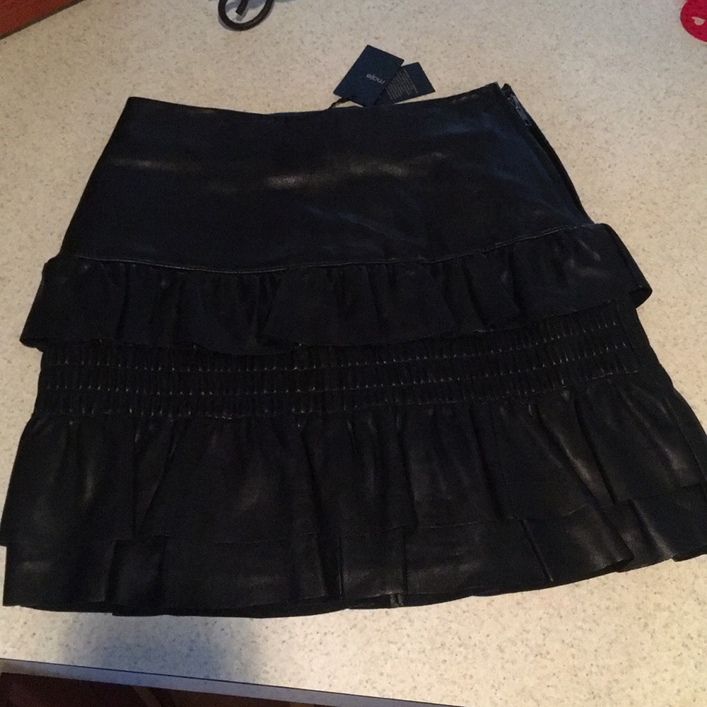 Black leather mini skirt